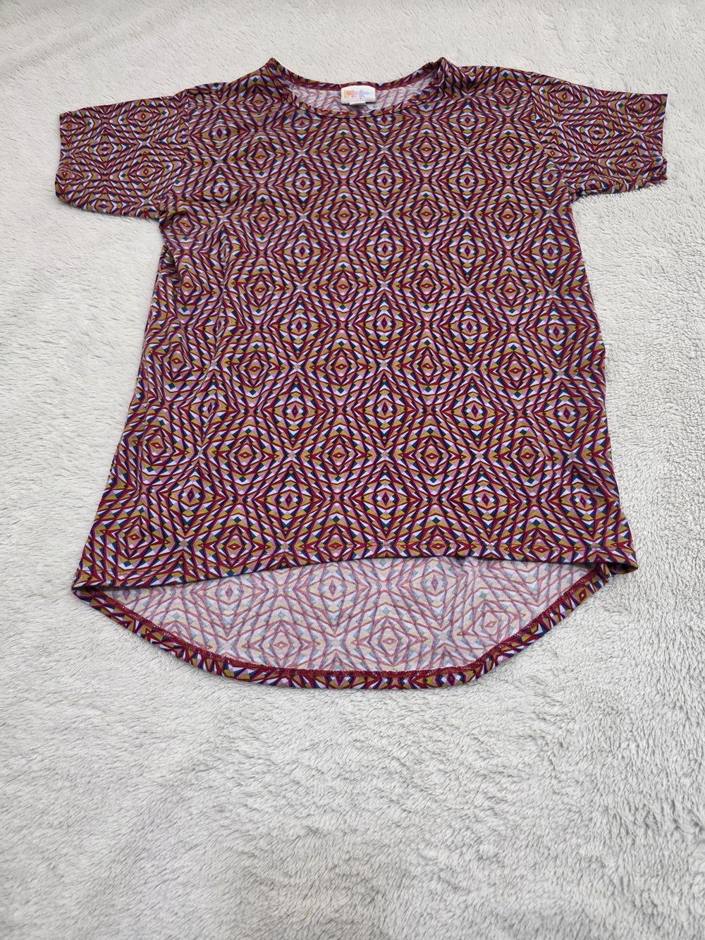 LuLaRoe Kids Short Sleeve Tee in Burgundy, Pink, Mustard & Teal Geometric Print